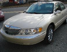 2002 Lincoln Continental after collision repair at Reliable Auto Body with factory-quality finish
