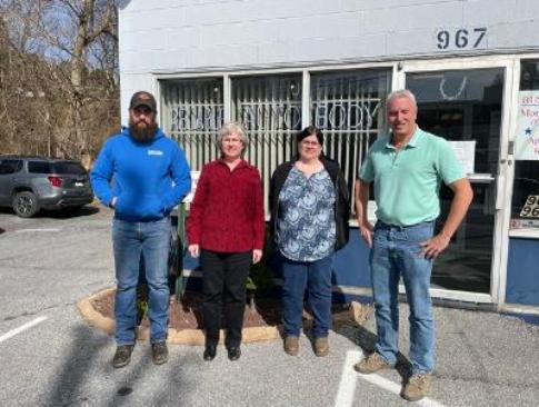 Reliable Auto Body office staff ready to assist customers with estimates and insurance claims
